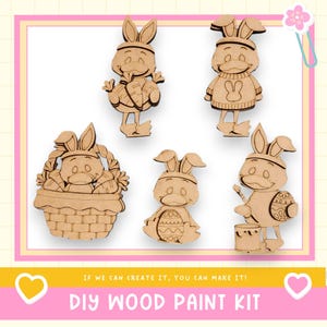 May include: A collection of unfinished wooden Easter bunny cutouts in various poses. One bunny holds carrots, another wears a sweater, and one plays a drum. The words "DIY WOOD PAINT KIT" are at the bottom.