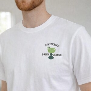 woman wearing funny margarita embroidered t shirt