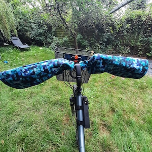 Warm, waterproof bike sleeves and saddle covers in blue tones image 2