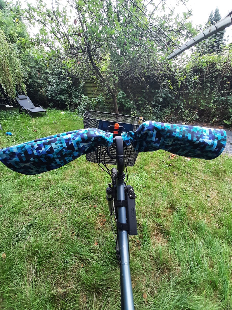 Warm, waterproof bike sleeves and saddle covers in blue tones image 2