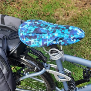Warm, waterproof bike sleeves and saddle covers in blue tones image 7