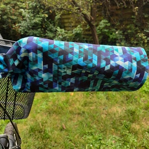 Warm, waterproof bike sleeves and saddle covers in blue tones image 3