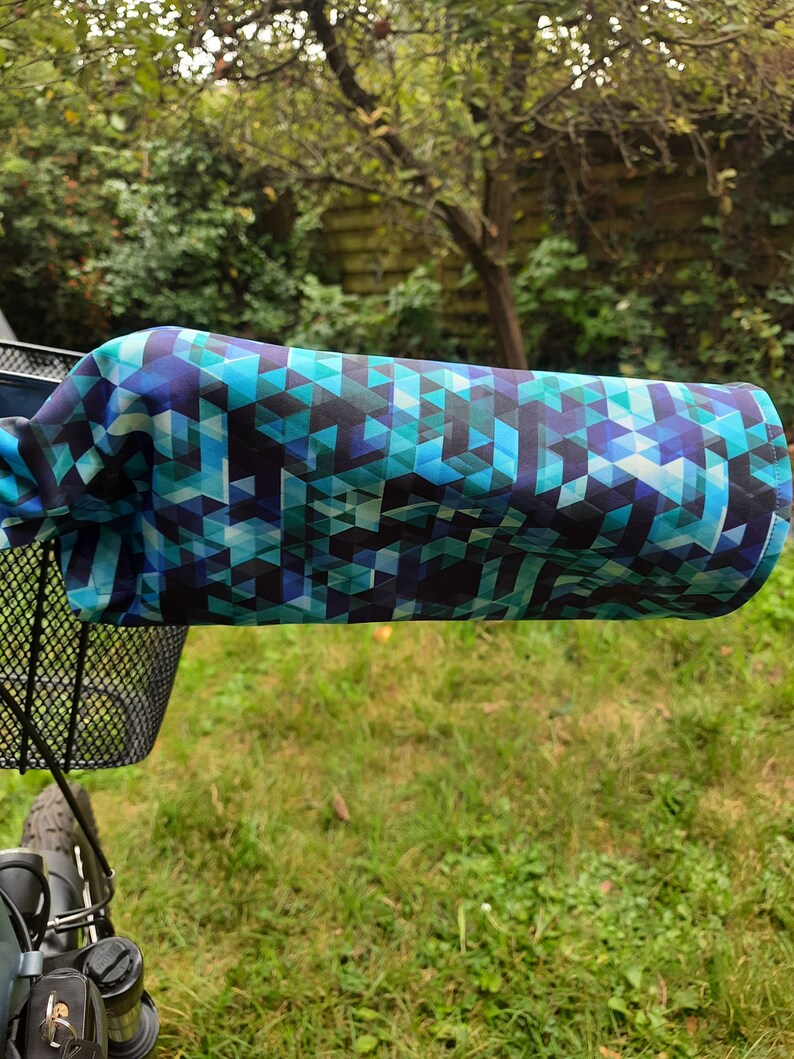 Warm, waterproof bike sleeves and saddle covers in blue tones image 3