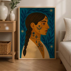 May include: A framed art print featuring a profile of a person with brown hair in a braid and decorative face and neck markings. The background is teal with leaf and star designs. The person is wearing a white top.