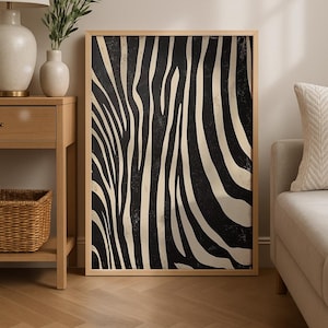 May include: A framed art print featuring a black and cream zebra stripe pattern. The artwork is displayed in a natural wood frame, adding a touch of warmth. The print's bold design makes it a striking decor piece.