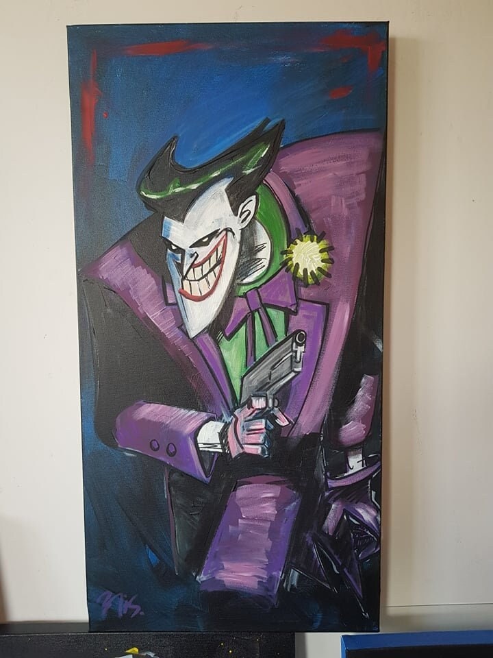 Tableau Batman Joker avec un carré d'As flambant entre les doigts