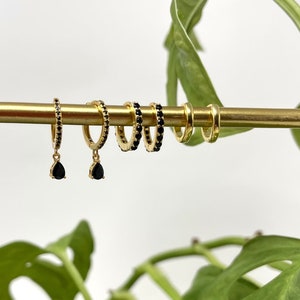 Black & gold teardrop huggie earrings
