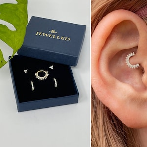 Sterling silver and clear stone helix , huggie and stud earrings
