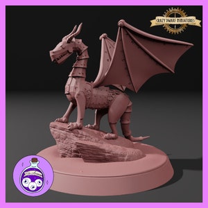 May include: A brown steampunk dragon figurine with articulated joints, wings, and horns, perched on a rock. The dragon is set on a round base. The Crazy Dwarf Miniatures logo is visible in the upper right corner.