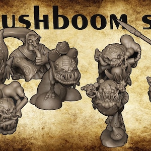 May include: A set of seven fantasy miniature figurines, painted in shades of gray, depicting various mushroom-like creatures. The set includes a goblin-like figure holding a spear, a mushroom-like creature with a large mouth, and several other unique mushroom-themed figures. The set is labeled "Mushboom Set" and "Crazy D'mare Miniatures".