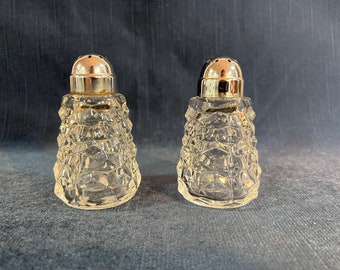 Pair of Fostoria American Salt and Pepper Shaker Set with Metal Lids