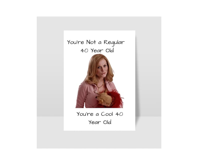 May include: A greeting card with a photo of a woman holding a stuffed animal. The card reads "You're Not a Regular 40 Year Old You're a Cool 40 Year Old".