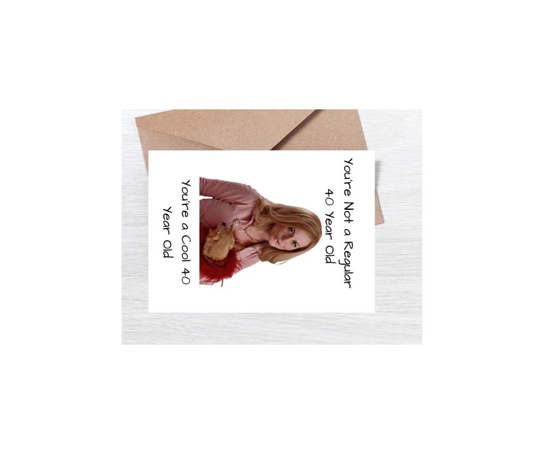 May include: A humorous greeting card featuring a woman in a pink shirt holding a stuffed animal. The card reads "You're Not a Regular 40 Year Old. You're a Cool 40 Year Old."
