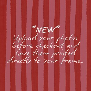 May include: A square graphic with vertical stripes in alternating shades of dark red and muted pink. Centered white text reads: *NEW* Upload your photos before checkout and have them printed directly to your frame.