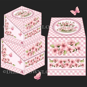 May include: Pink and white gingham boxes with floral and butterfly designs. The boxes feature illustrations of pink flowers and butterflies, with a teacup and flowers on the top. The boxes are stacked and arranged on a dark background.