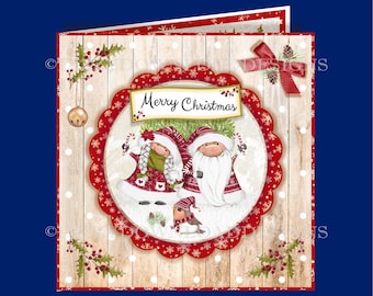 May include: A Christmas card with a red and white scalloped border. The card features two gnomes, one female and one male, standing in front of a small Christmas tree. The card has the text "Merry Christmas" on a banner above the gnomes.