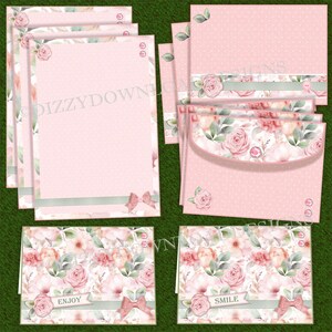 May include: Set of pink and green floral stationery with envelopes and cards. The cards have the words "Enjoy" and "Smile" on them.