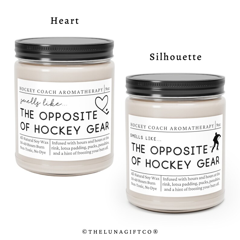 May include: Two 9oz soy wax candles with black lids and labels that read "Hockey Coach Aromatherapy" and "Smells Like... The Opposite of Hockey Gear". One candle has a heart icon and the other has a hockey player silhouette.