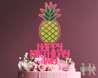 May include: Pink glitter cake topper with a yellow pineapple and the text "Happy Birthday Amy".