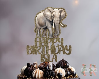 Può includere: Topper per torta con glitter dorati con un'illustrazione di elefante e il testo "Happy Birthday Isla".