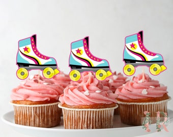 May include: Three pink cupcakes with white frosting and sprinkles topped with roller skate cupcake toppers. The roller skates are blue, white, yellow, and pink with a yellow star on the side.