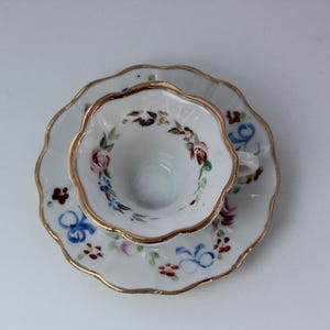 Hand Painted Cup And Saucer