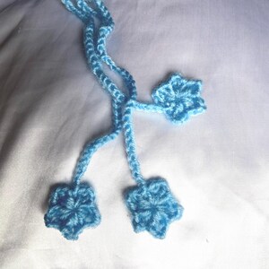 crochet star/moon bookmark in blue