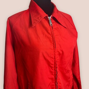 Chaqueta de golf de marca de tarjeta de puntuación roja vintage de los años 80 con cremallera de metal Cuello puntiagudo M / L