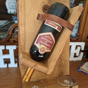 Wine bottle holder made of solid 80 year old oak