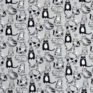 May include: A light gray fabric featuring a repeating pattern of various cats in black, white, and gray tones. The design includes sitting and lying cats with striped, spotted, and solid markings, interspersed with small black heart outlines.