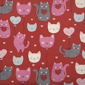 May include: A fabric pattern featuring a repeating design of cats in shades of pink, gray, and white on a dark red background. The cats are depicted holding red hearts, floating with heart-shaped balloons, or as simple faces with small pink hearts.