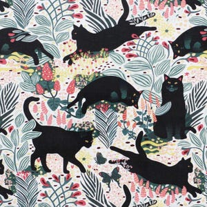 May include: A fabric pattern featuring black cats in various poses, including sitting, walking, and stretching, interspersed with botanical elements like green leaves, yellow flowers, pink buds, and dark butterflies on a white background.