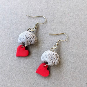Thinking of you: anatomical brain and heart dangling earrings (brain-theme earrings molded from 3D printed MRI brain images)