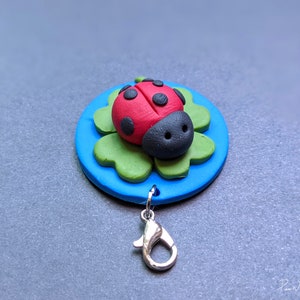 Cute ladybug/ladybird and four leaf clover charm (lucky charm!)