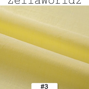 Peut inclure: Gros plan sur un tissu jaune clair pli&eacute;. Le tissu a un aspect textur&eacute; avec des d&eacute;tails de tissage visibles. Le texte "ZellaWorldz" est en haut et le num&eacute;ro "#3" dans un rectangle blanc en bas. Le tissu semble &ecirc;tre un textile.