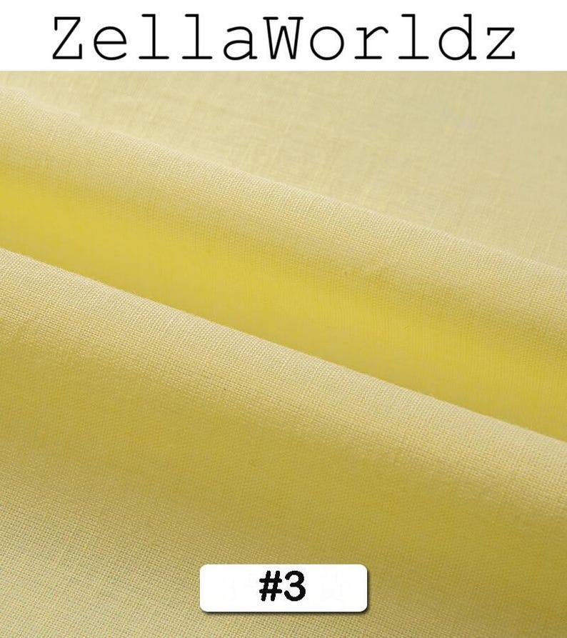 Peut inclure: Gros plan sur un tissu jaune clair pli&eacute;. Le tissu a un aspect textur&eacute; avec des d&eacute;tails de tissage visibles. Le texte "ZellaWorldz" est en haut et le num&eacute;ro "#3" dans un rectangle blanc en bas. Le tissu semble &ecirc;tre un textile.