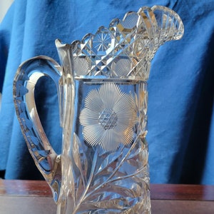 Crystal pitcher with flowers