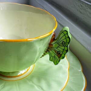 Spectacular 1930s Aynsley butterfly handle green teacup trio with crocus shaped cup, saucer and side plate, made in england