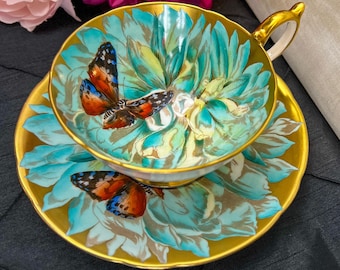 EXTREMELY RARE Aynsley Butterfly and Blue Chrysanthemum Teacup and saucer in near mint condition, made in england