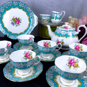 Near mint condition Vintage Royal Albert Enchantment tea for 6, 24 pieces with Tall teapot, dessert plates, teacups trios