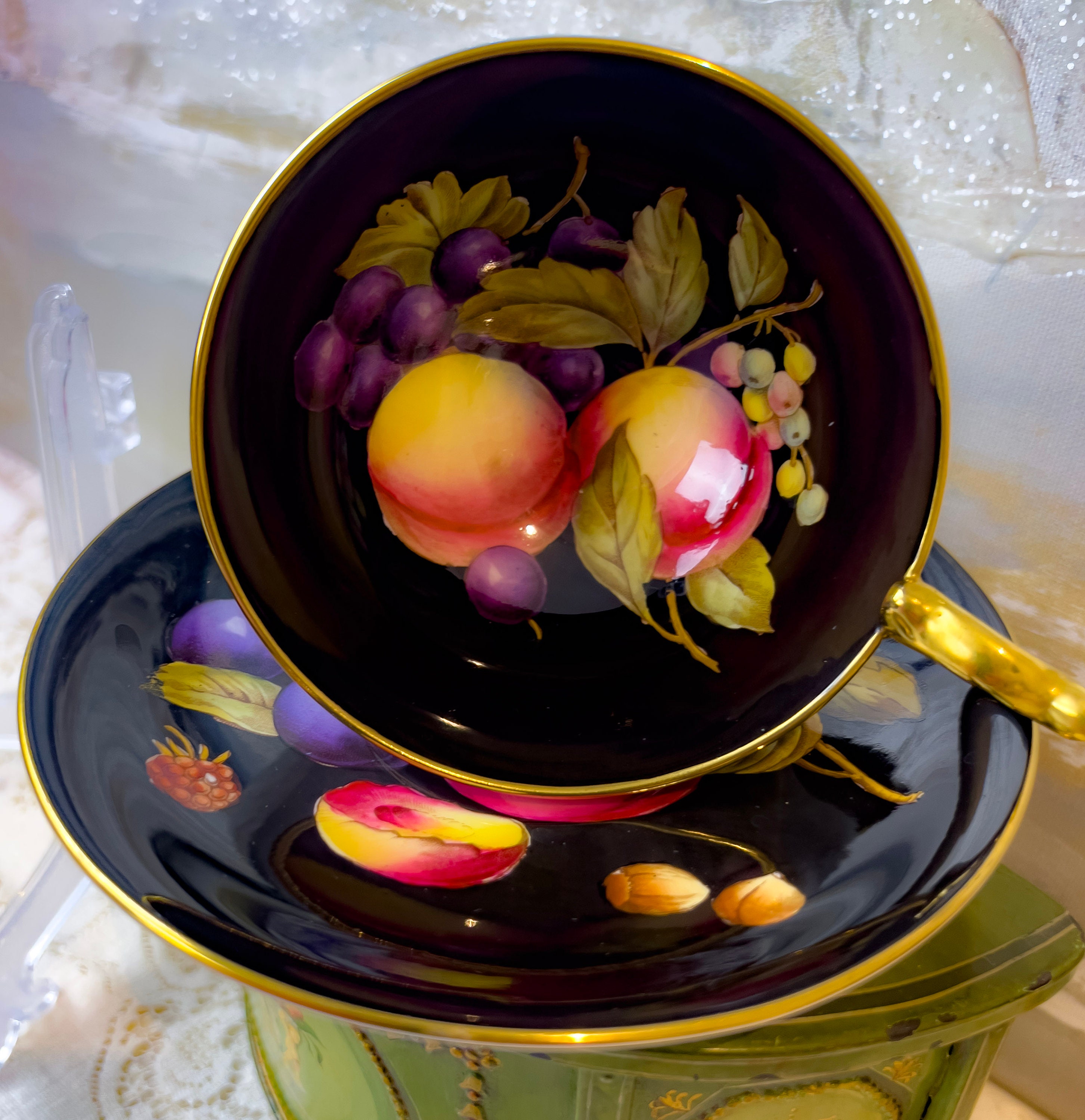 Rare Black Aynsley Orchard Fruit Teacup and Saucer, D. Jones