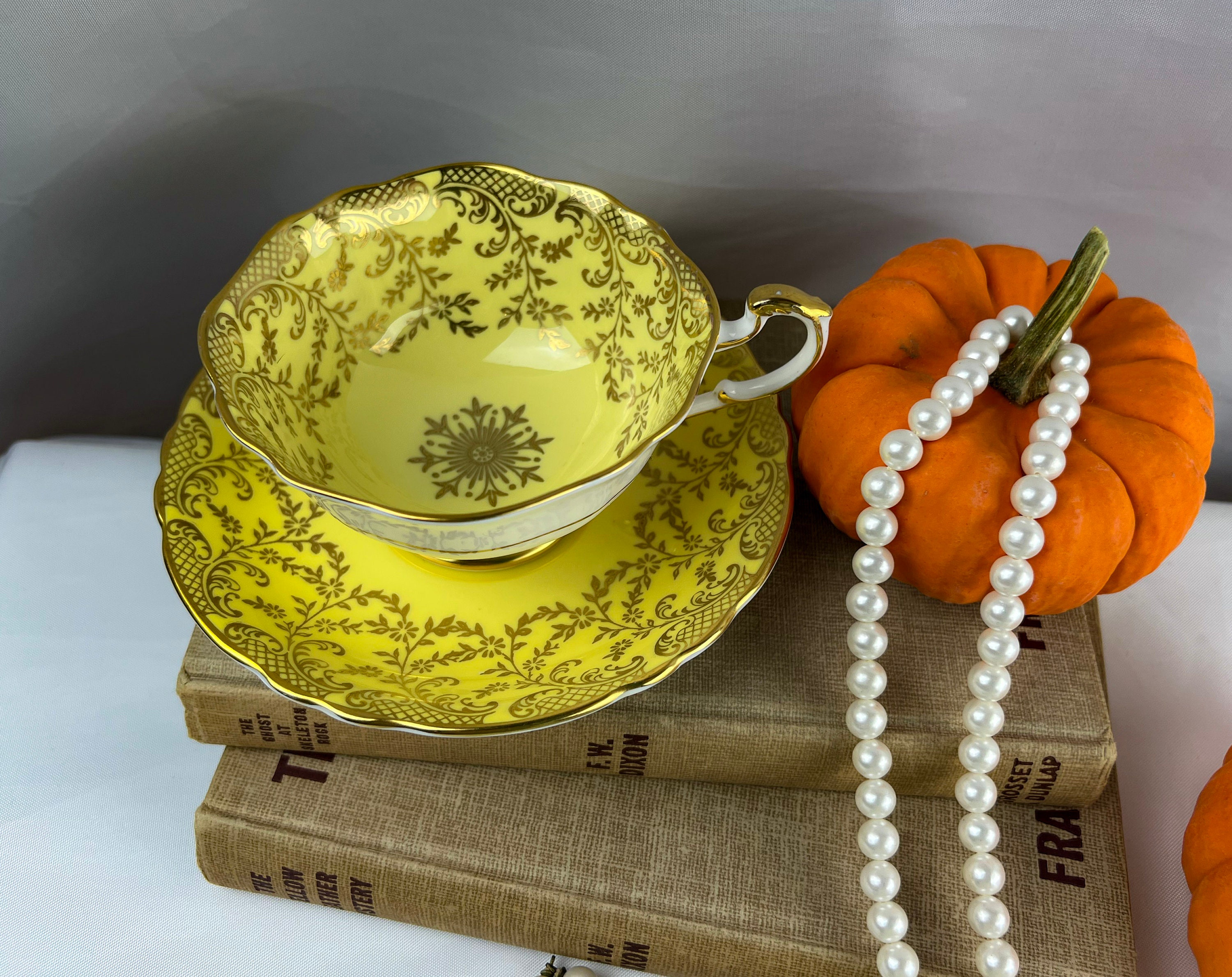 Vintage Paragon Yellow and Gold Chinz Double Warrant Teacup and