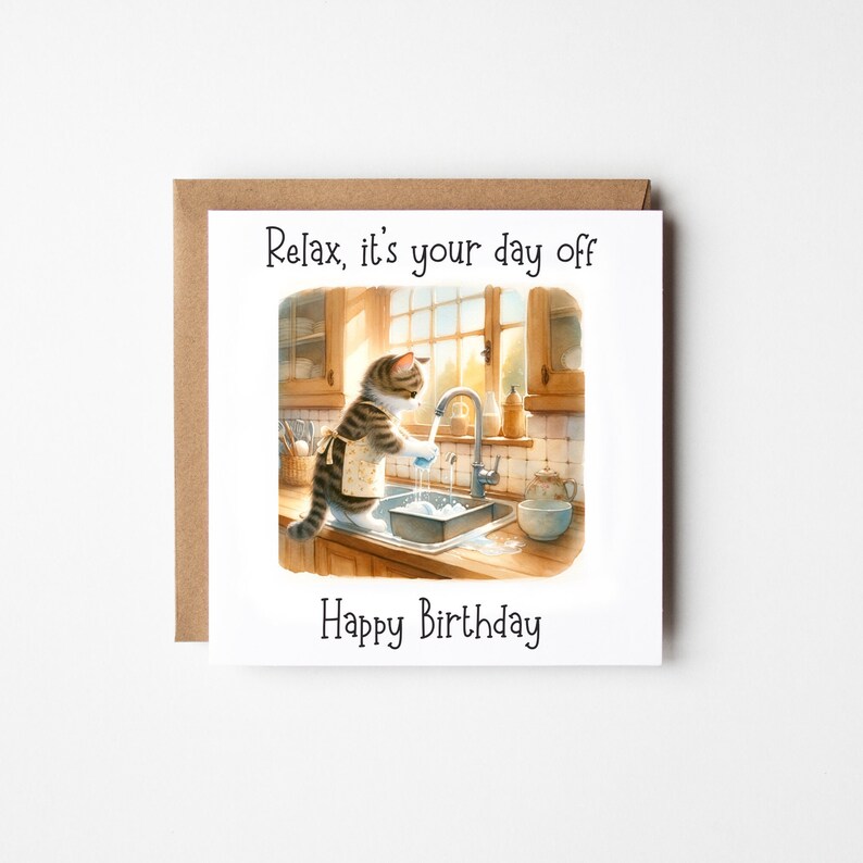 May include: A birthday card featuring a cartoon cat washing dishes in a kitchen sink. The card reads "Relax, it's your day off" and "Happy Birthday".