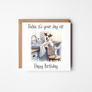 May include: A white and brown dog wearing a striped apron stands on a stool in a kitchen sink, washing dishes. The text "Relax, it's your day off" is above the dog and "Happy Birthday" is below the dog.