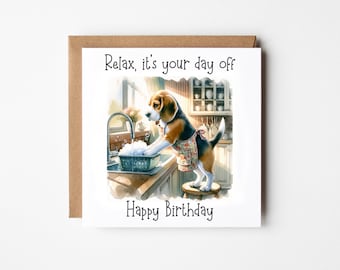 May include: A birthday card featuring a cartoon beagle dog wearing an apron and washing dishes in a kitchen sink. The card reads "Relax, it's your day off" and "Happy Birthday".