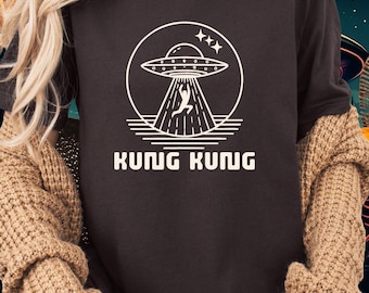 レジデント・エイリアン カンカン UFO誘拐 Tシャツ – SFコメディ グラフィックTシャツ