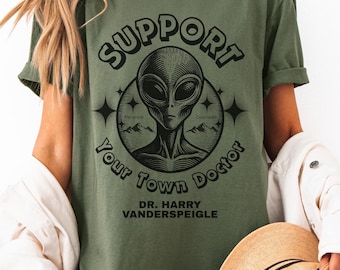 レジデント・エイリアンTシャツ、あなたの街の医者を応援しよう、SFコメディTシャツ、ユニセックスTシャツ