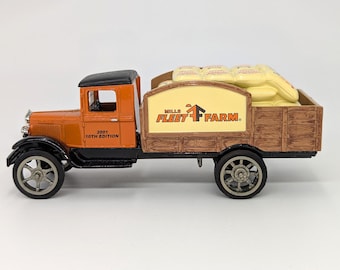Vintage ERTL 7" Die Cast Metal Replica of 1931 Hawkeye Delivery Truck that is also a Coin Bank - V4311