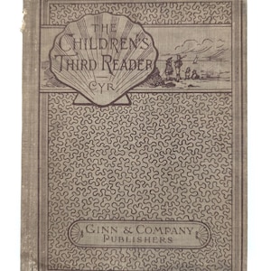 May include: A white ceramic mug with a black handle and the text "But First, Coffee" in a handwritten style. The mug is on a white surface. The mug is 4 inches tall.