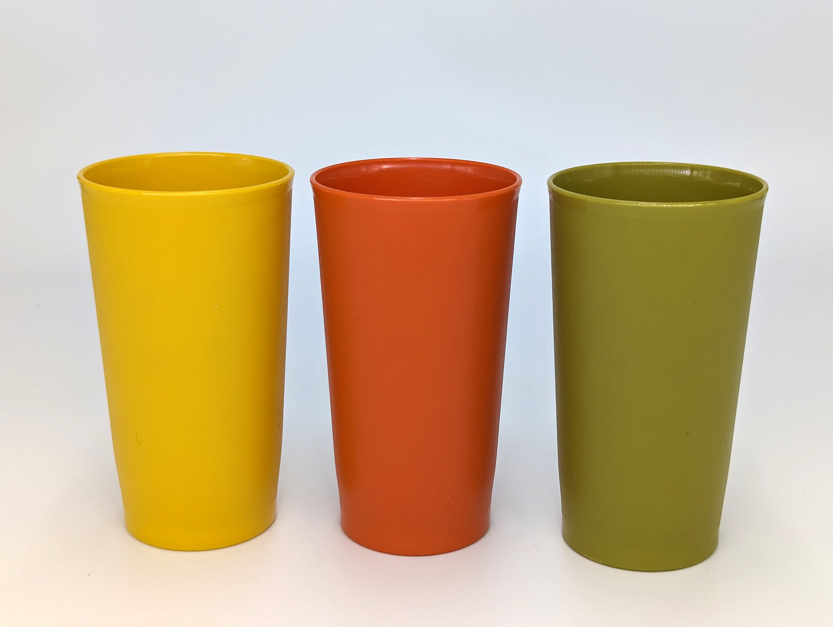 Retro 70s Tupperware containers & tumblers in harvest gold, orange, green